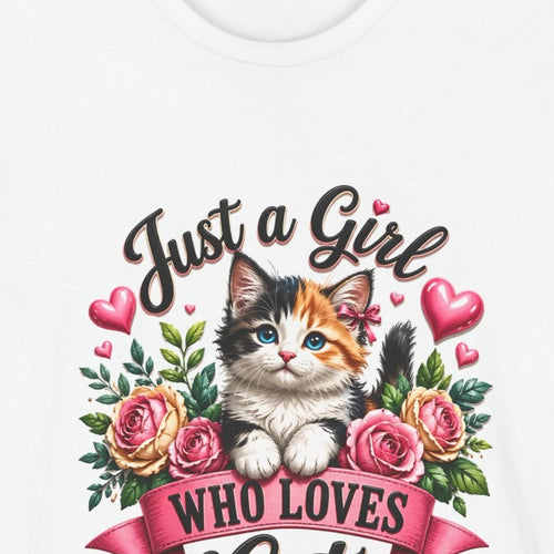 Close-up of the Just a Girl Who Loves Cats print: calico kitten with a pink bow in a wreath of roses and hearts, on the White tee